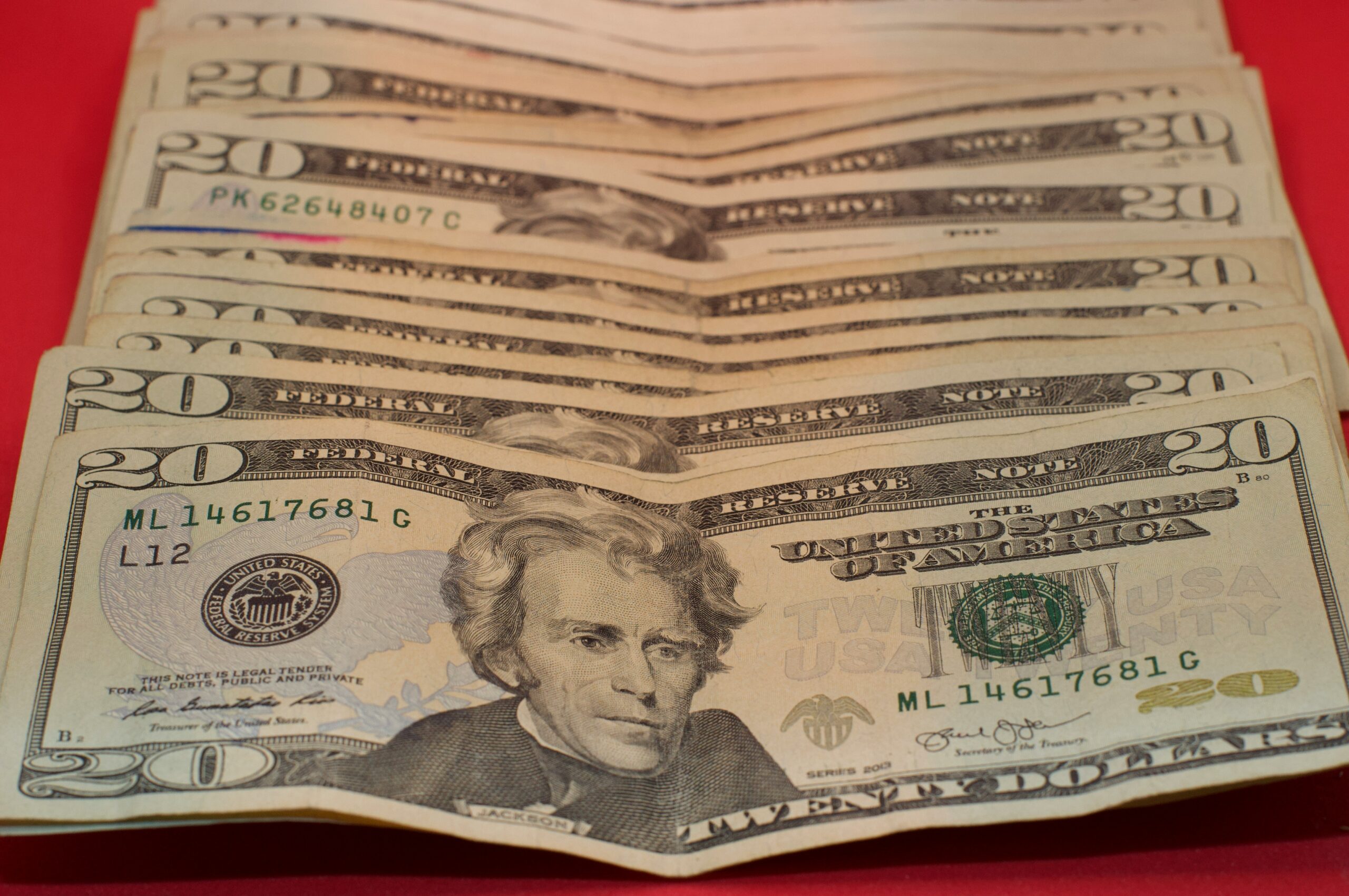US dollar bills representing cashing checks after hours or late at night