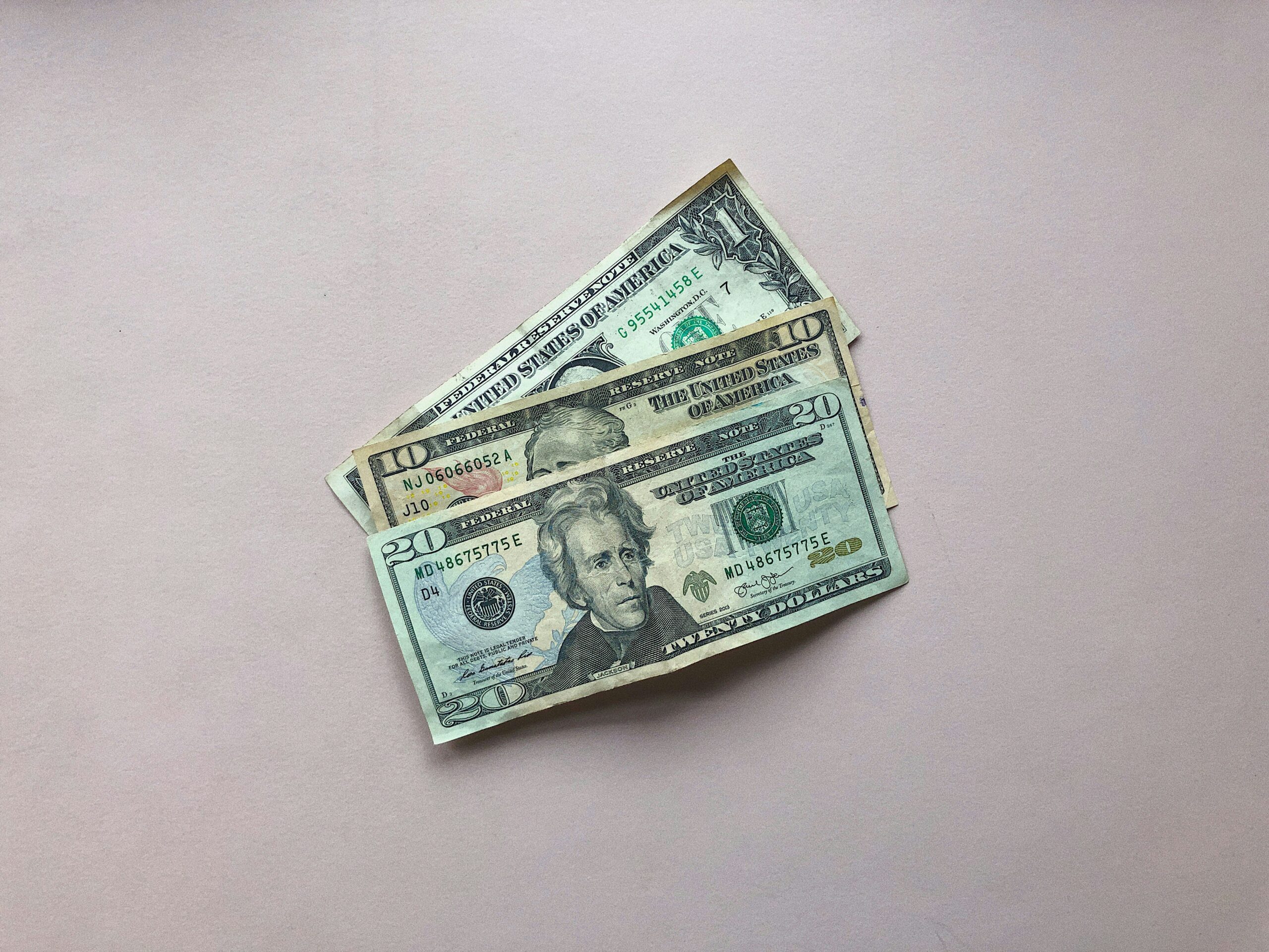 Assorted US dollar bills representing cash check options without a bank or ID